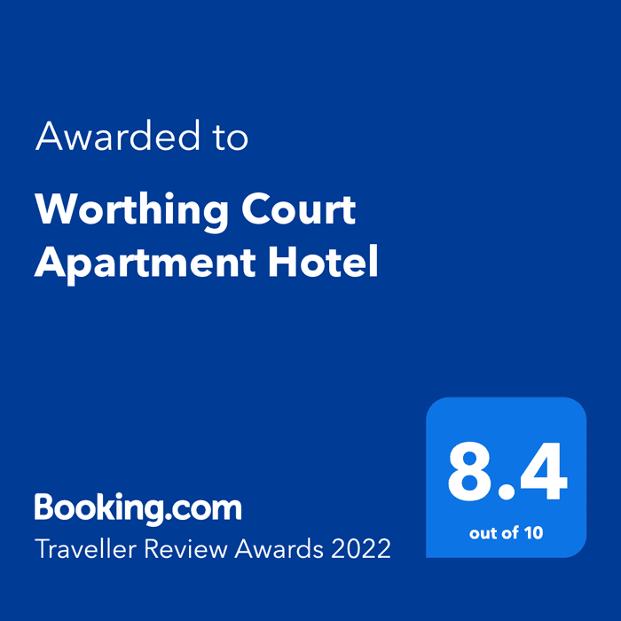 Booking. com Traveller Review Awards 2022 banner with a score of 8.4 at Worthing Court Apartment Hotel