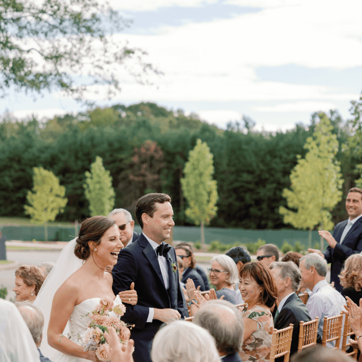 Bride being walked down the isle