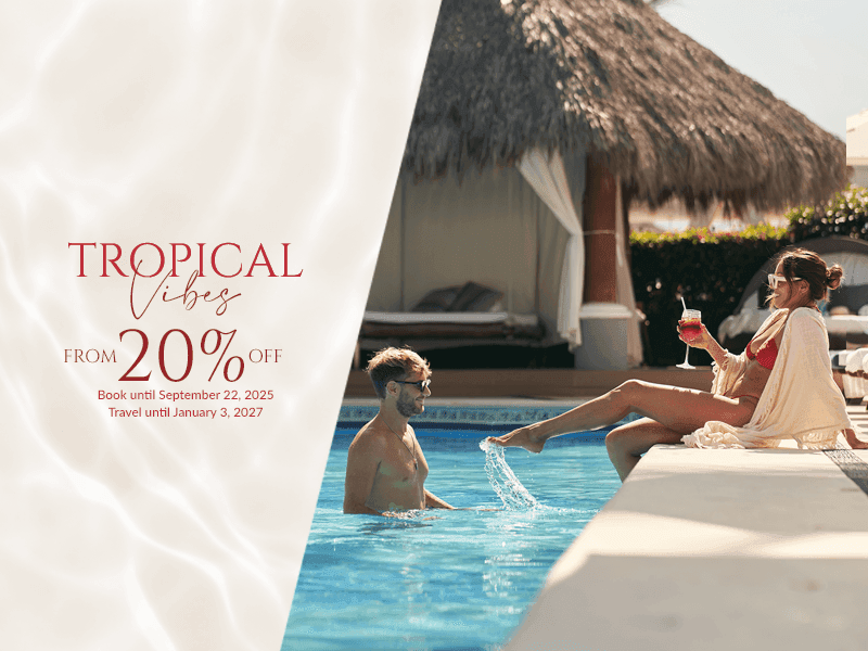 Promotional image for Tropical Vibes with 20% off, featuring a couple by a pool.
