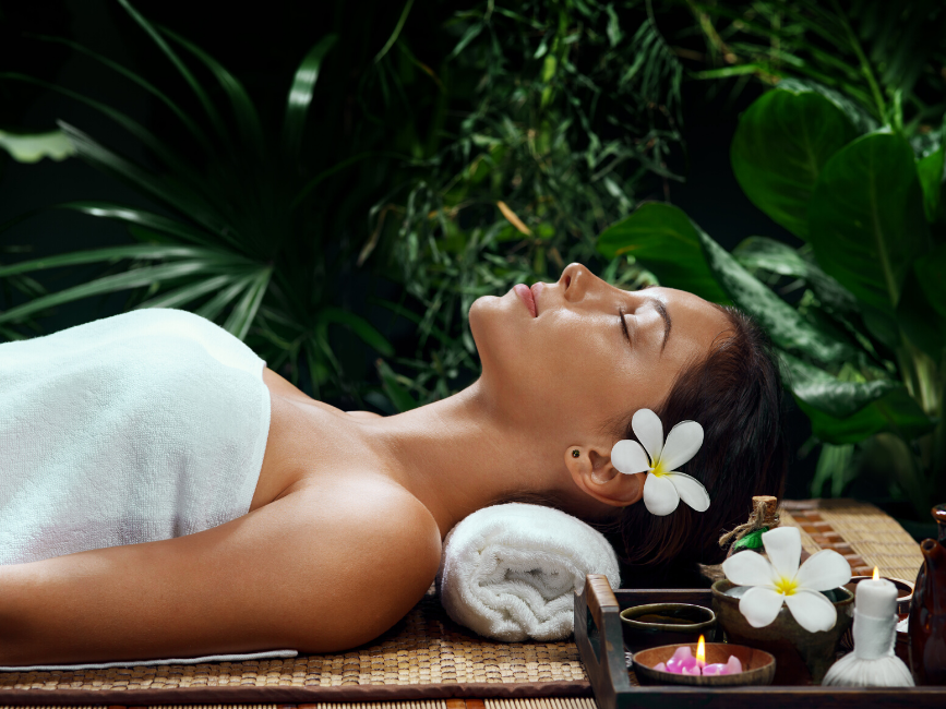 woman lying down for spa treatments at Amora Hotel