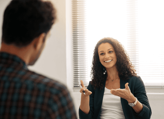 A lady having a speech with a man at Honor’s Haven retreat