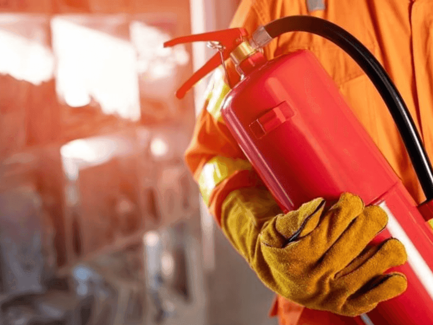 Fireman holding fire hydrant at Brady Apartment Hotel Flinders Street