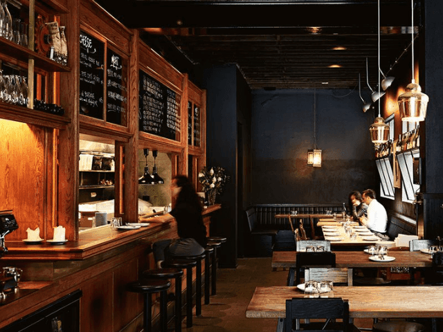 Bar counter by dining area in Embla Wine Bar at Brady Hotels Jones Lane