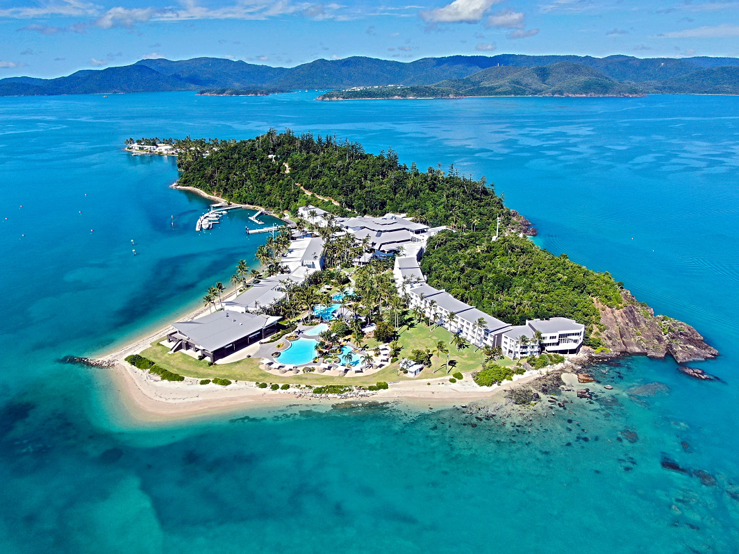 Aerial view of the ocean and Daydream Island Resort