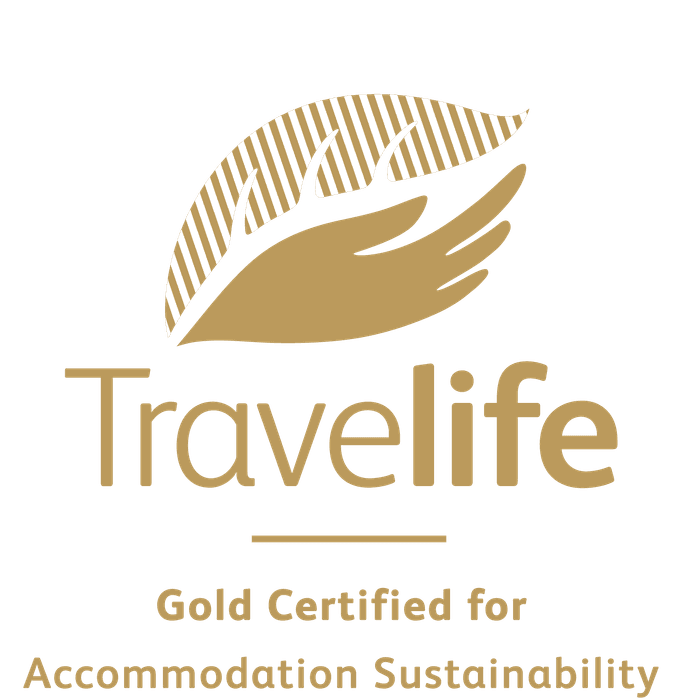 Travelife Gold Certified logo for accommodation sustainability used at Worthing Court Apartment Hotel