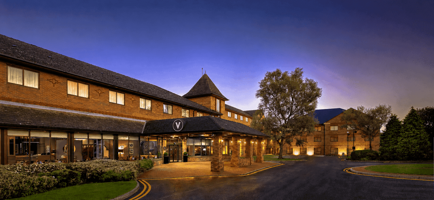 Brick exterior and covered entrance driveway at Village Hotel Sheffield, highlighting modern stays across Sheffield hotels