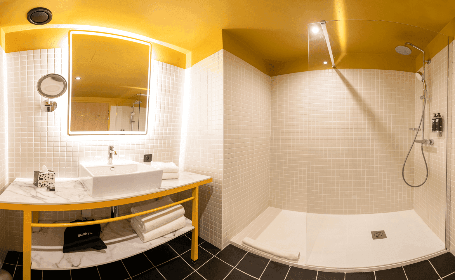 Bathroom vanity & shower area in Apartment at Kopster Hotel Paris Ouest Colombes