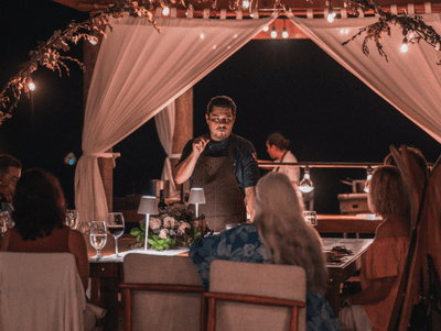Elegant candlelit dinner setting at Villa Premiere Hotel Boutique and Romantic Beach Resort Puerto Vallarta