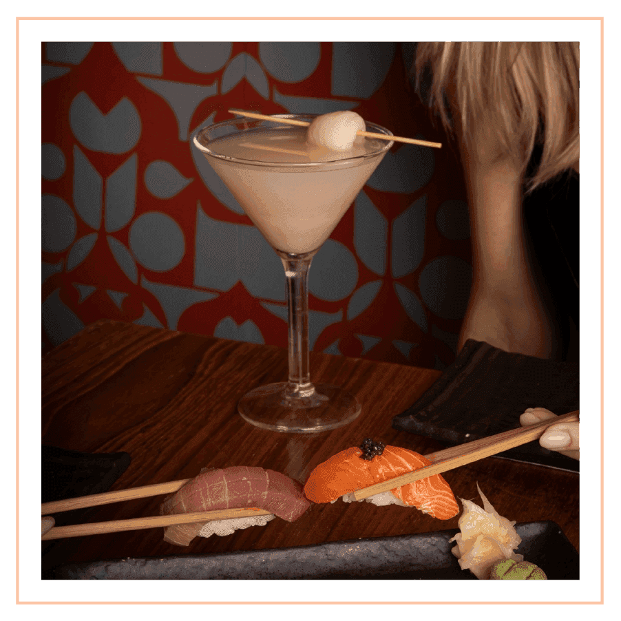 A martini glass with two pieces of Nigiri sushi served in Blue Ribbon Sushi Bar & Grill at The Plymouth Hotel South Beach