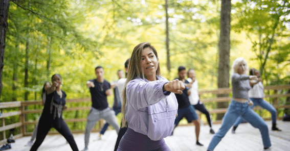 People engaged in Healing Qigong session near Honor's Haven Retreat