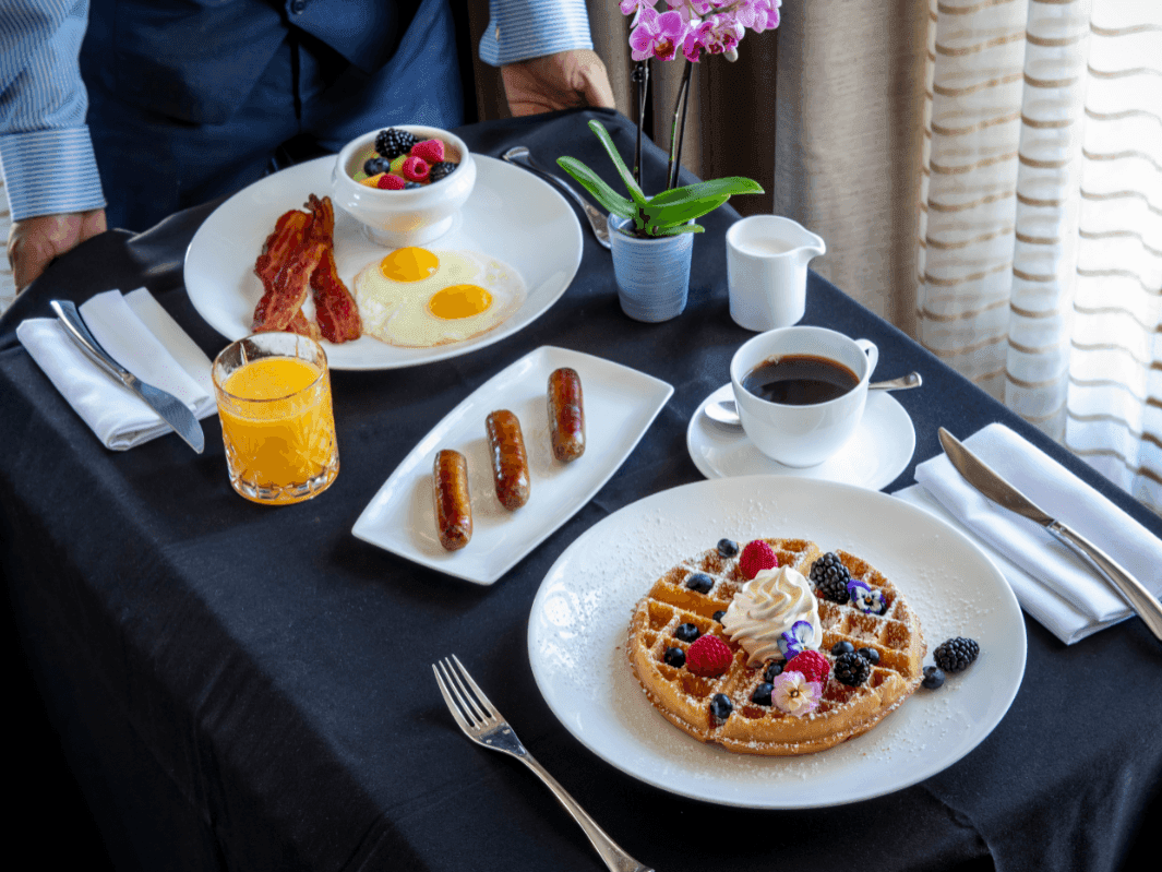 Serving breakfast to a room at The Townsend Hotel