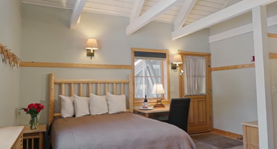 Interior of the Family room with king bed at Sleeping Lady