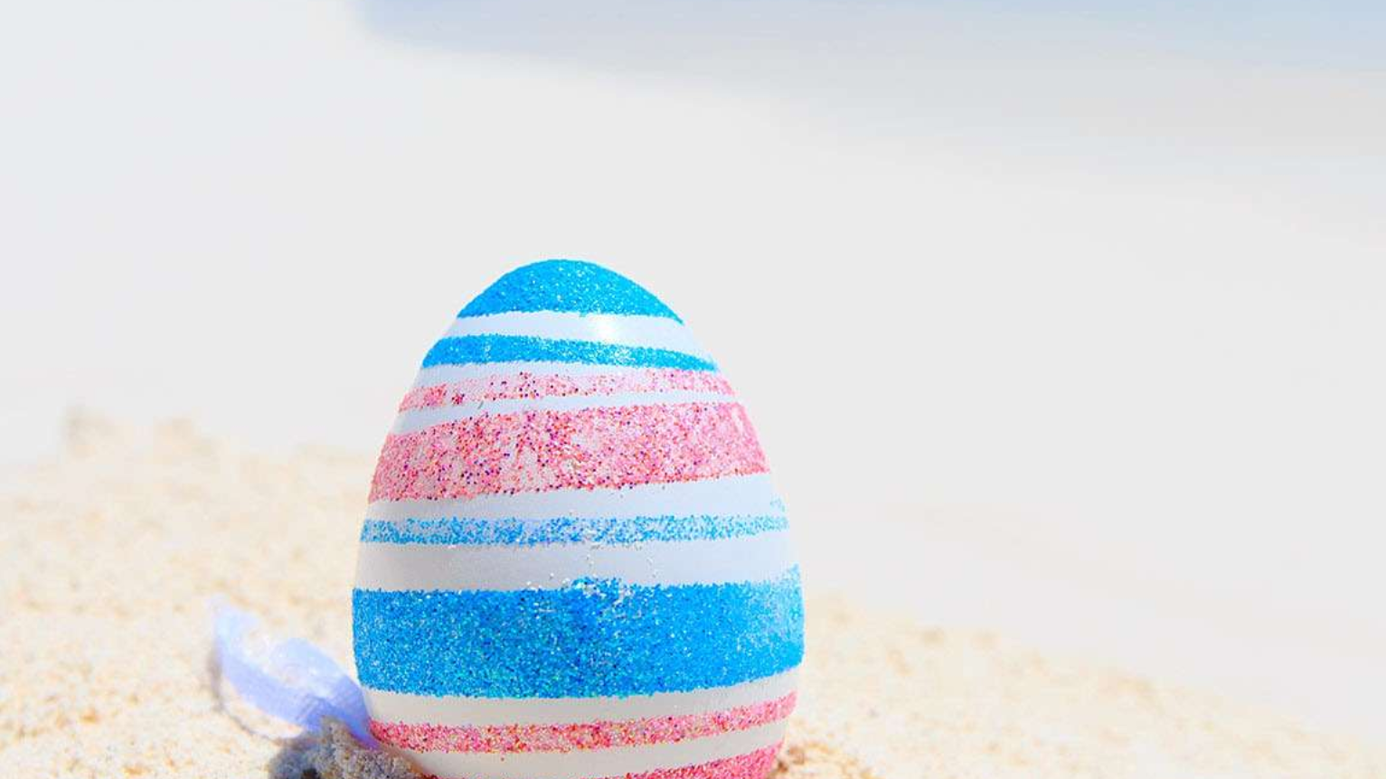 An easter egg on the beach near The Signature Collection