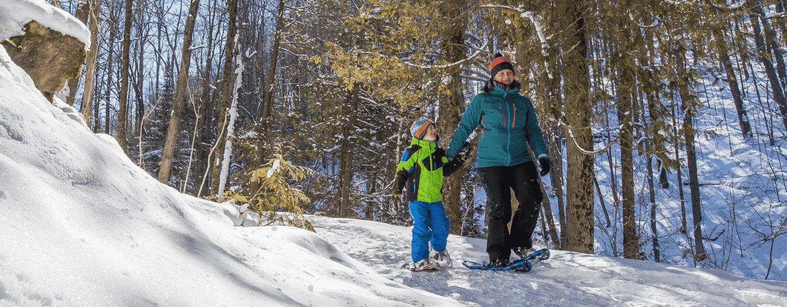 Mother & son skiing near Bluefin Bay Family of Resorts