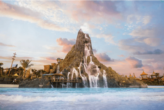 Large artificial mountain with cascading waterfalls beside a wave pool at sunset at Showboat Hotel & Resort Atlantic City