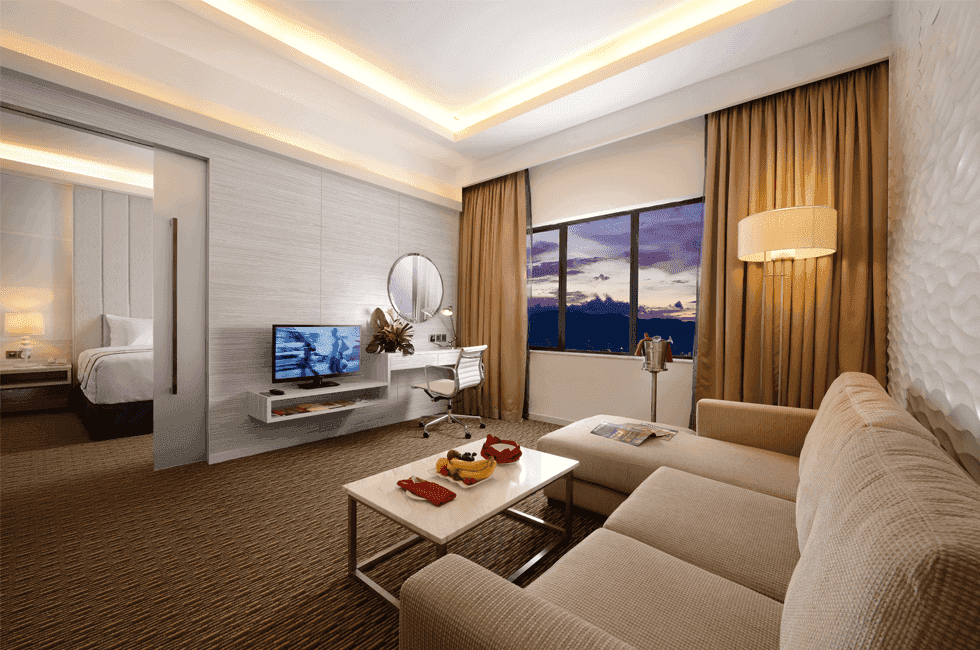 Living room with sofa seating in Executive Suite at Sunway Hotel Georgetown