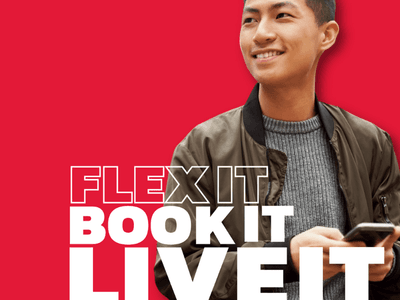 Male Student smiling against red background with text promoting flexible booking options at UniLodge Melbourne Central.