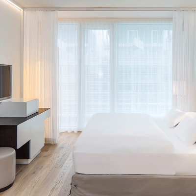 Double bed in Superior Room at Falkensteiner Hotel Jesolo