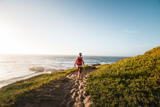 a person walking on a trail