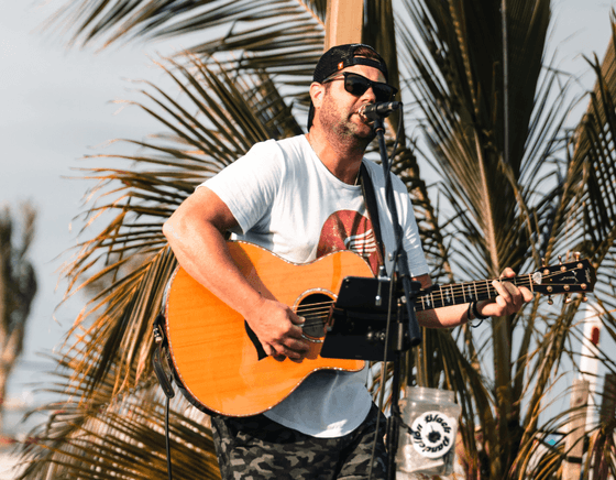 A musician performs at the summer concert series at our Diamond Beach hotel