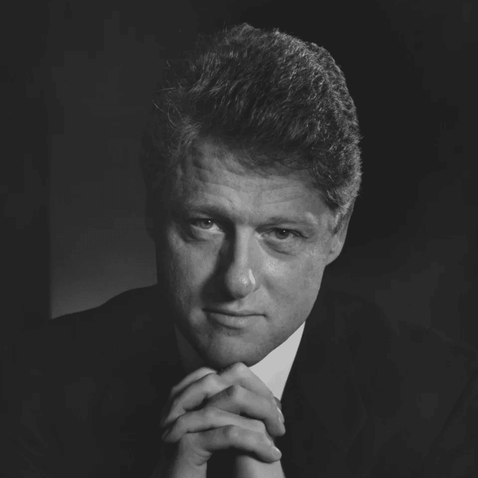 Black and white portrait of Bill Clinton by photographer Yousuf Karsh, displayed near Arlington Resort Hotel & Spa