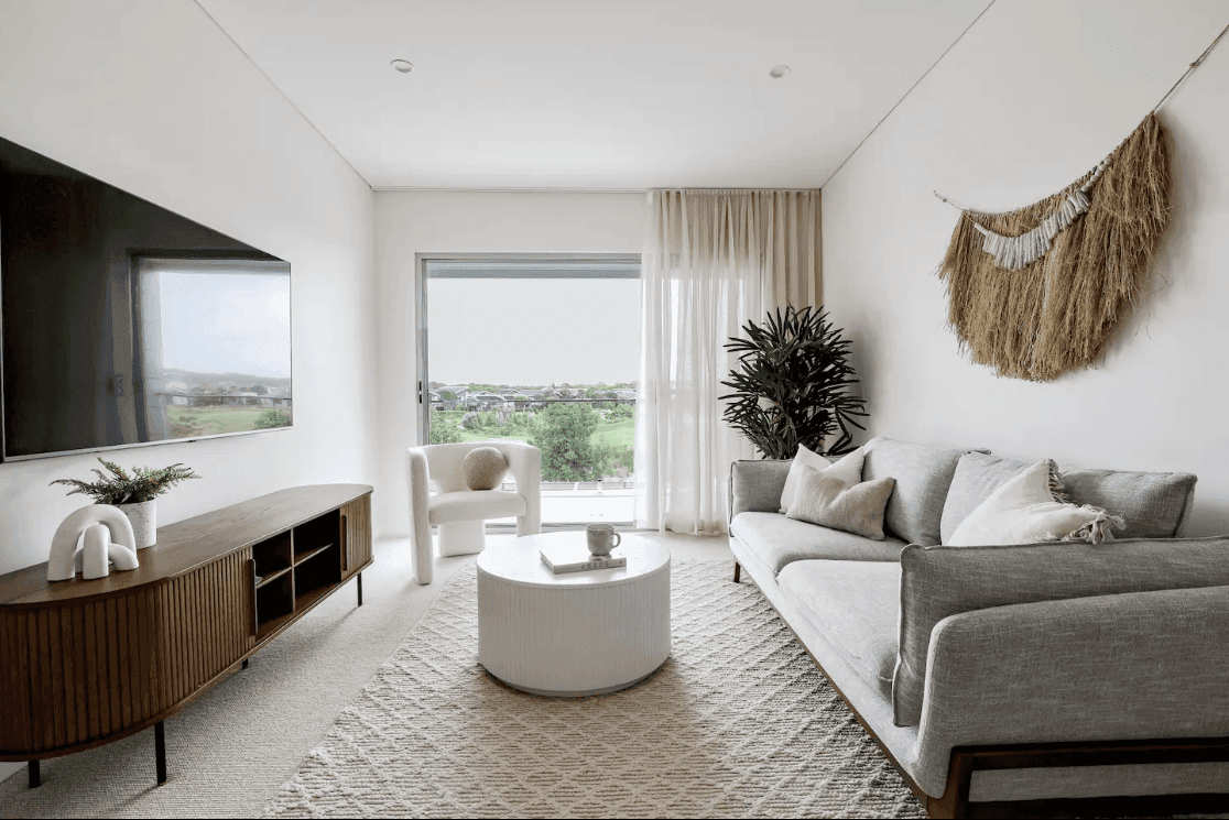 beach styled lounge room with golf course views