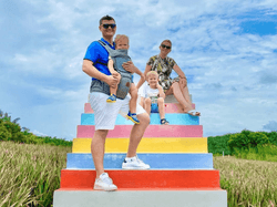 Family at Colourful Sky Ladder Pineapple Farm