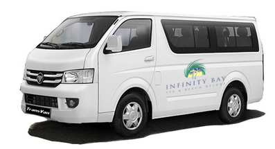 A van with the logo of Infinity Bay Spa & Beach Resort