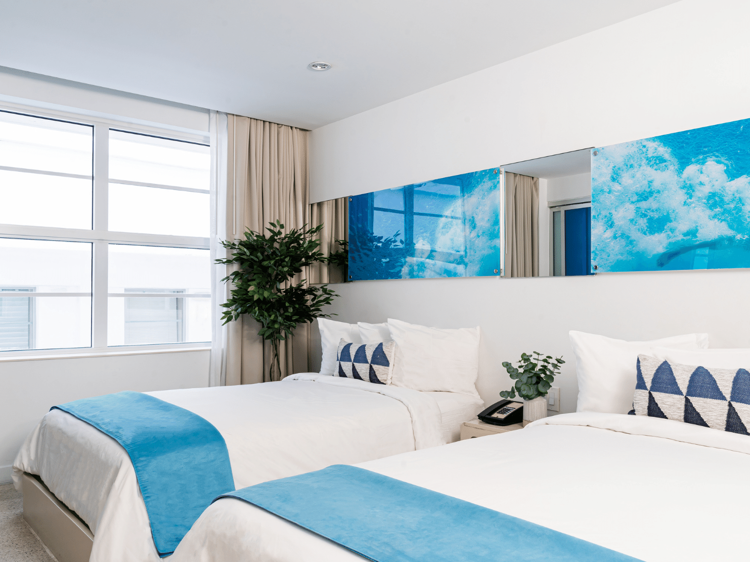 Dual double beds in classic room at Clevelander South Beach
