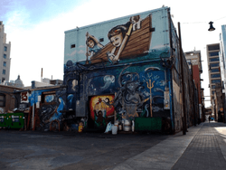 A building with all arts on Freak Alley near Hotel 43