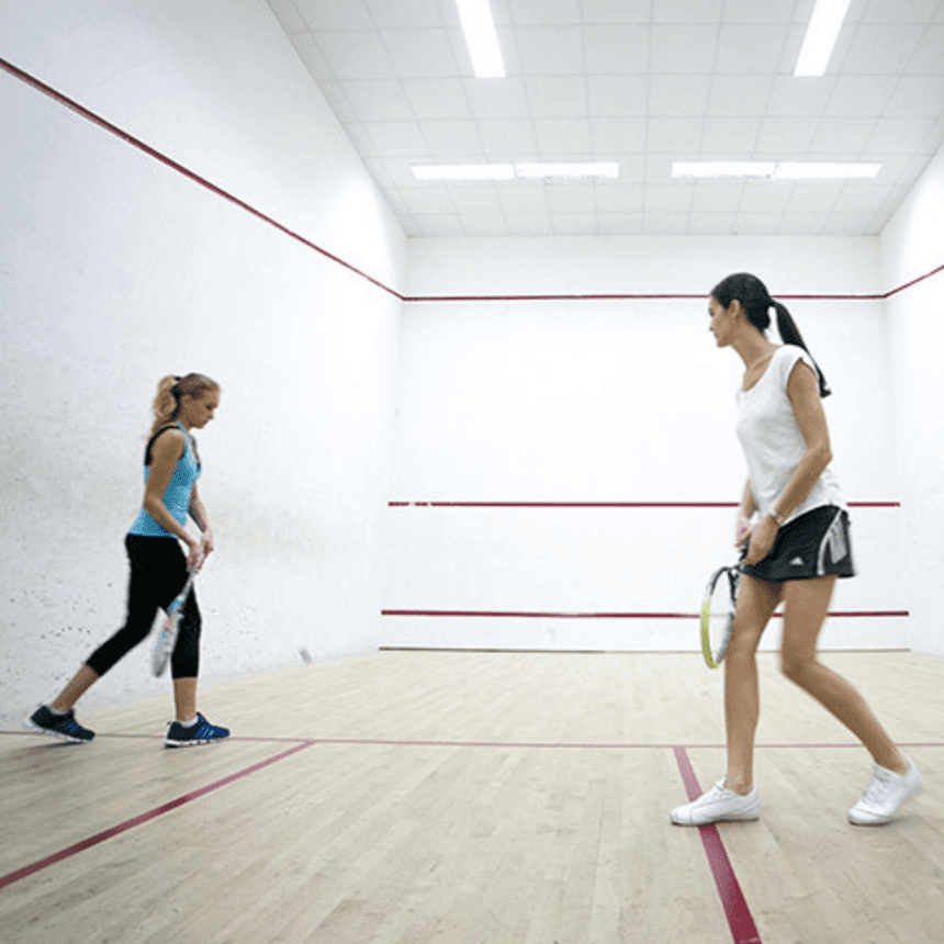 Players in the indoor tennis area at Two Seasons Hotel & Apt 