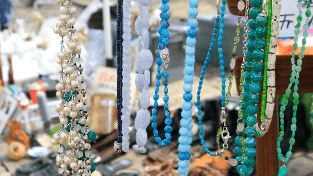 Colorful handmade beaded necklaces and jewelry displayed at Margaret River Town Square Markets outdoor vendor stall