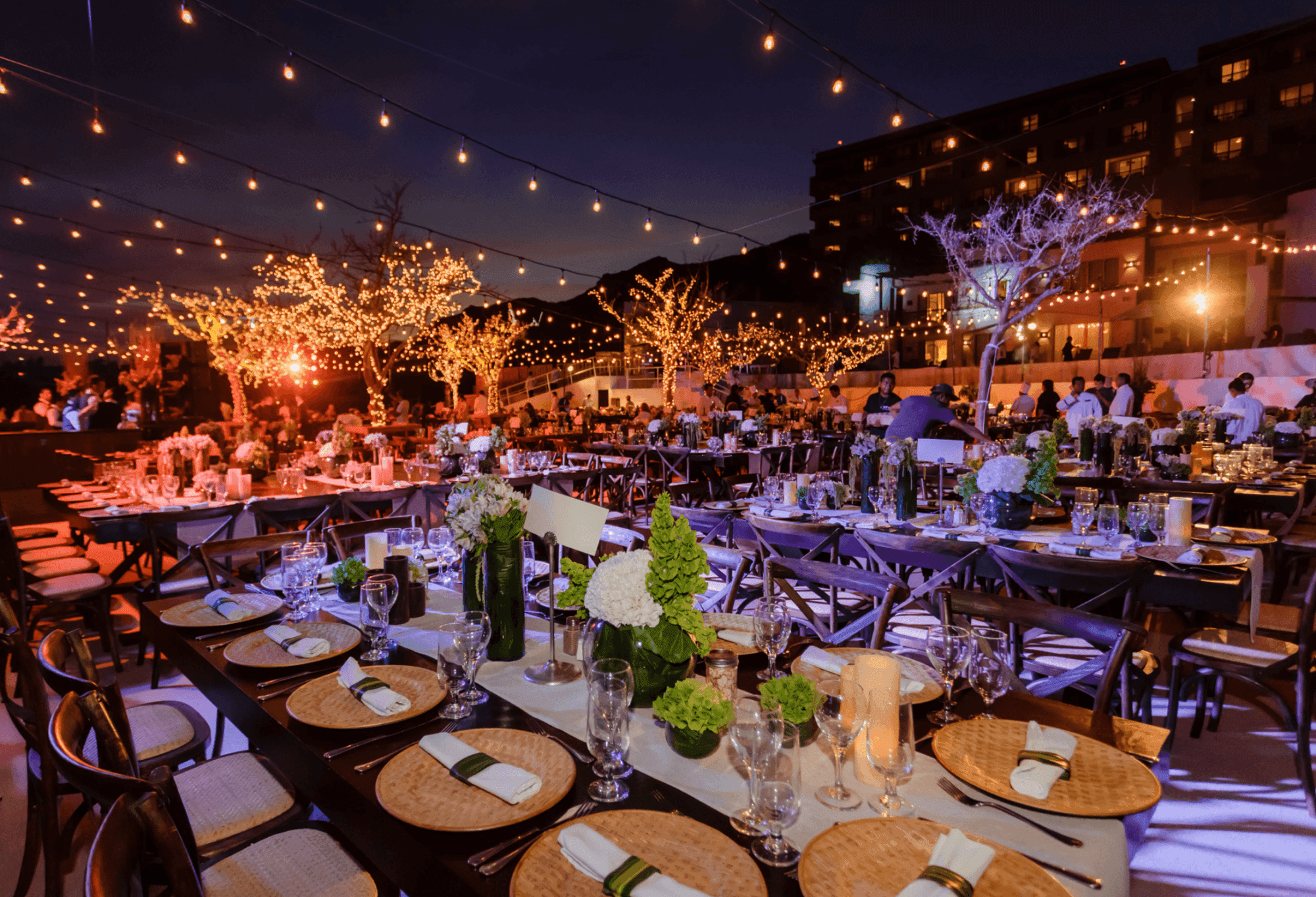 Outdoor dining setup arranged for an event at Marquis Los Cabos