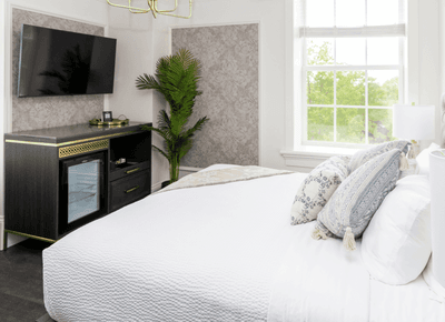 Modern bedroom with a TV dresser at Rodd Hotels & Resorts, an ideal option for places to stay in charlottetown