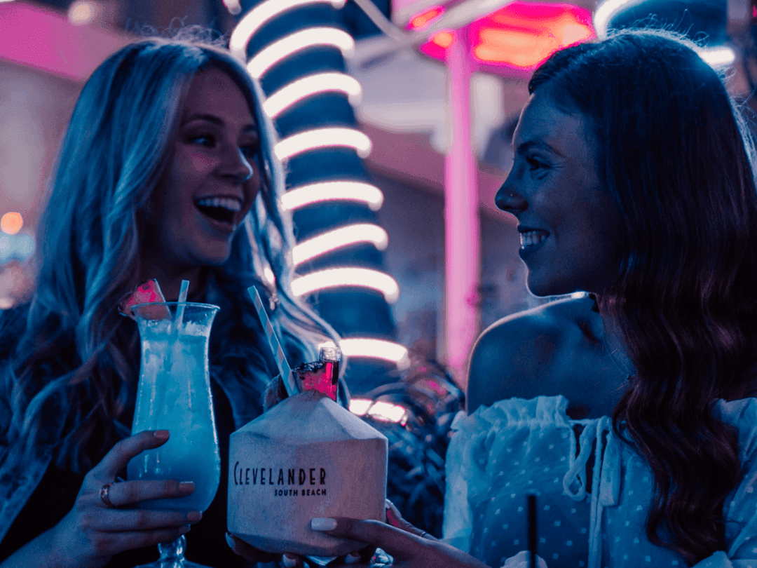 Girls having iced cocktails at Clevelander South Beach 