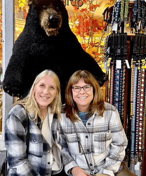 Two women wearing flannel shopping together 