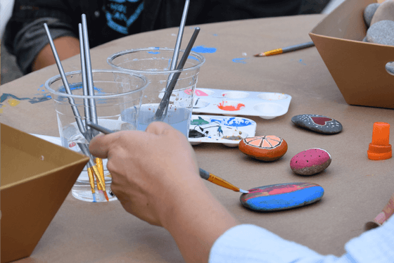 Art station activity with rock painting at Alderbrook Resort & Spa