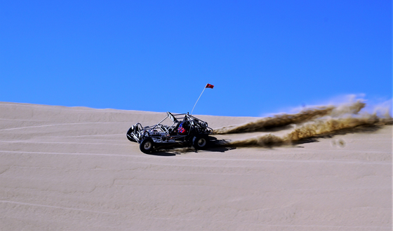 a go cart on sand dunes