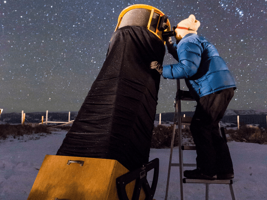 Man Stargazing at Jackson Hole near Hotel Jackson