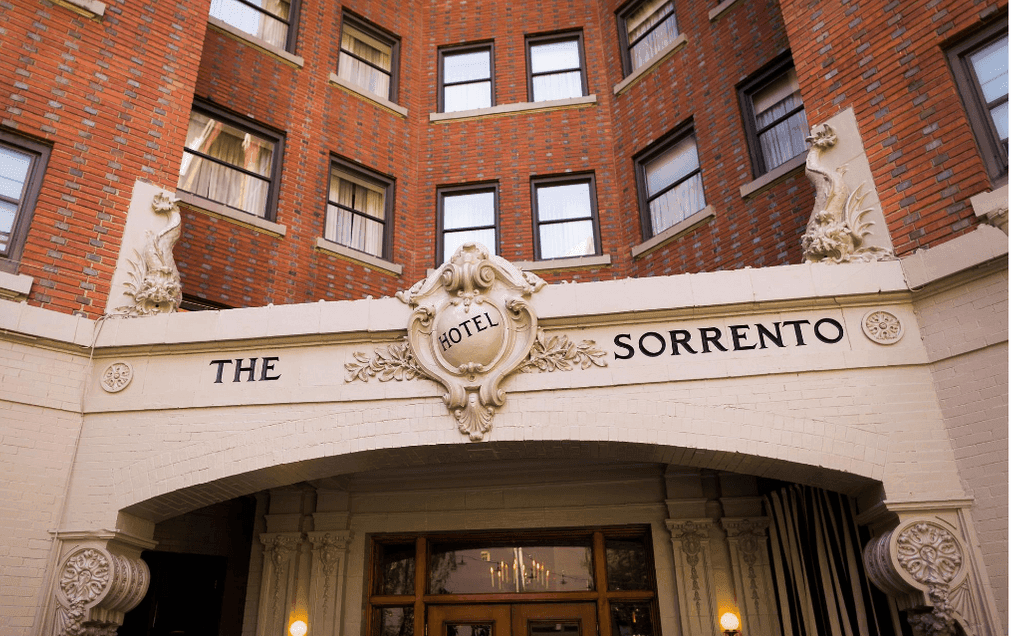 Exterior view of the entrance sign of The Hotel Sorrento