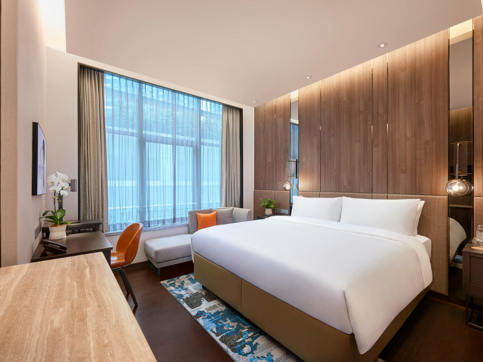 Bed & furniture in Premium Executive Room at Amara Hotel