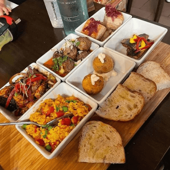 Breakfast arranged in the dining area at Nesuto Parramatta Apartment Hotel