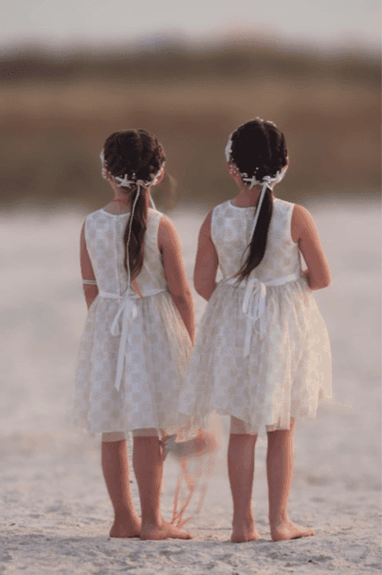 2 flower girls on the beach at Thunderbird Beach Resort