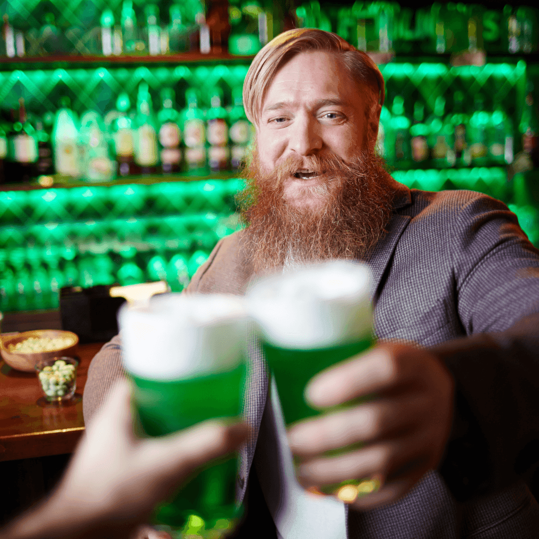 Friends cheering green beers for St. Patrick Day Celebration