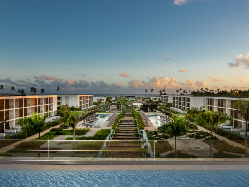 View of the hotel complex, garden & swimming pools at Live Aqua Resorts and Residence Club
