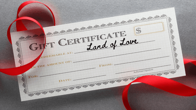 Close-up of a gift certificate by a red ribbon at Cove Pocono Resorts