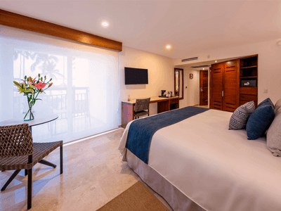 Deluxe King Bed with TV, comfy bed, work desk and closet at Buenaventura Grand Hotel and Spa
