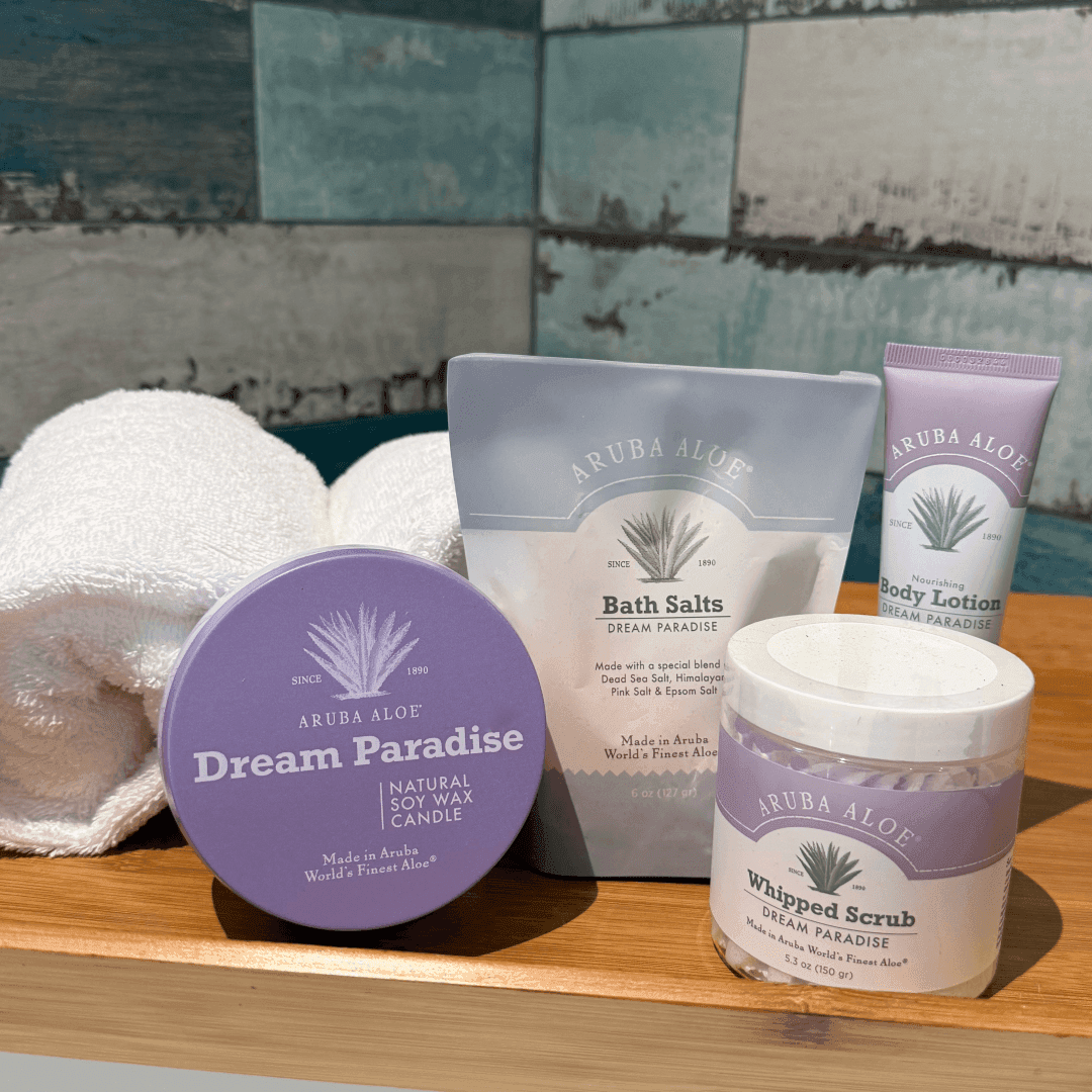Aruba Aloe wax candle, body lotion, and whipped scrub