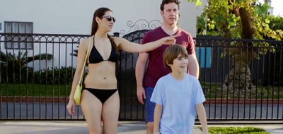 A family ready to enjoy the outdoor pool at Anaheim Hotel