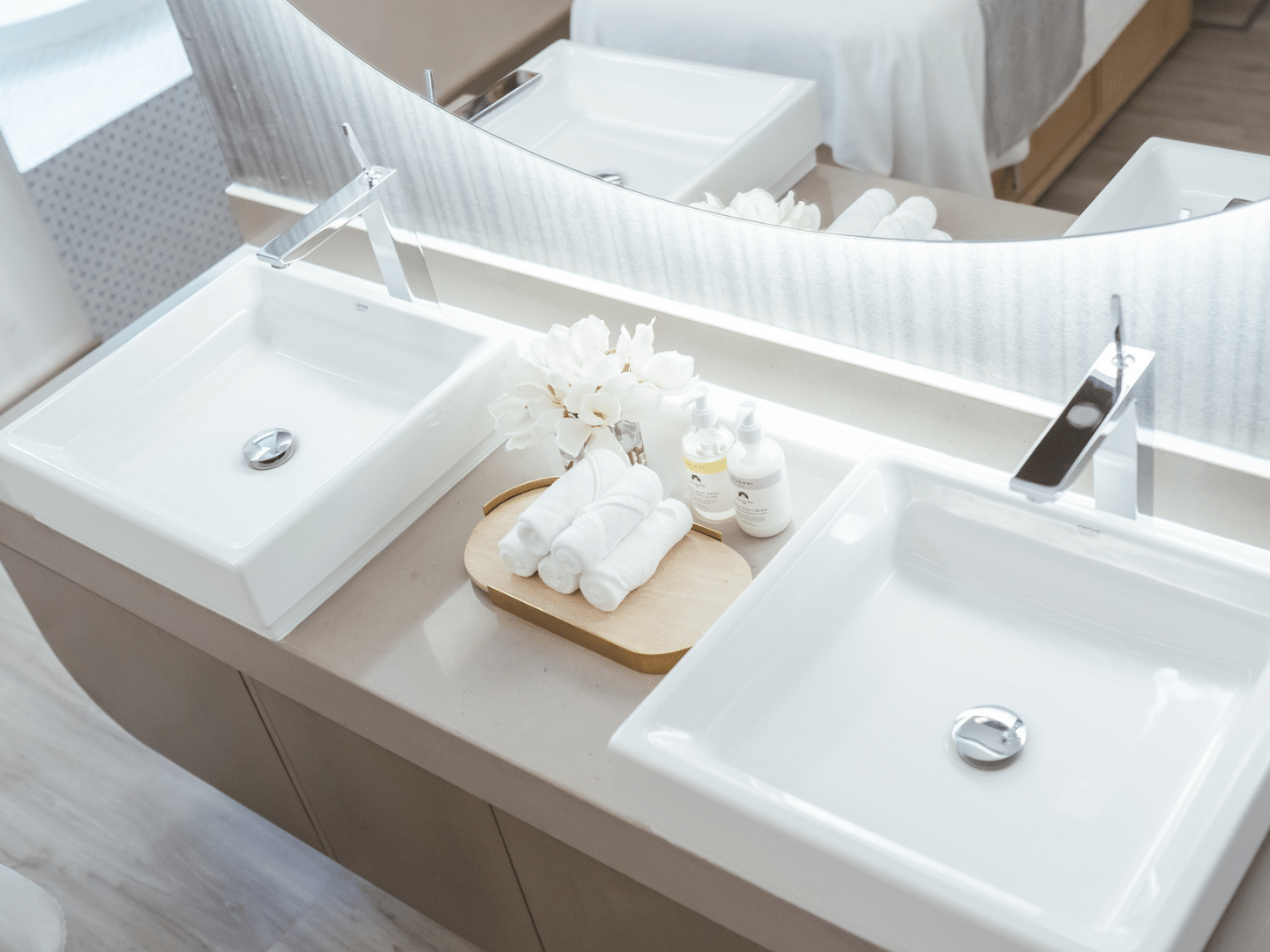 Two sinks with spa amenities in Pause Spa Château Berger at Paramount Hotel Midtown